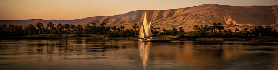 Egypt — a dahabiya under sail on the Nile