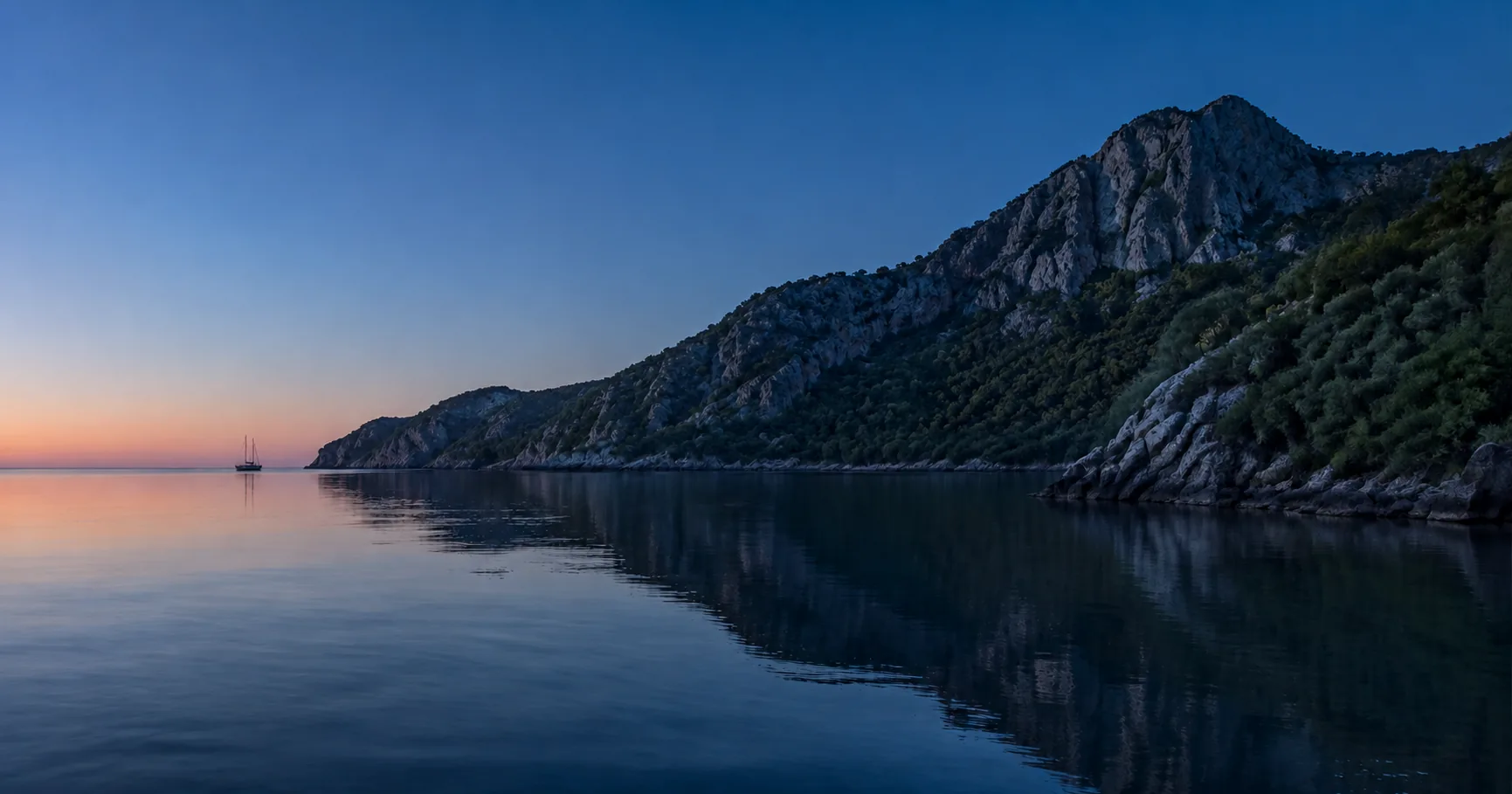 The same bay at dusk with the table set on deck